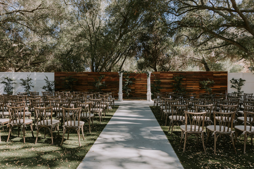 ceremony space with chairs and alter set up for a wedding ceremony at the oaks at duncan lane