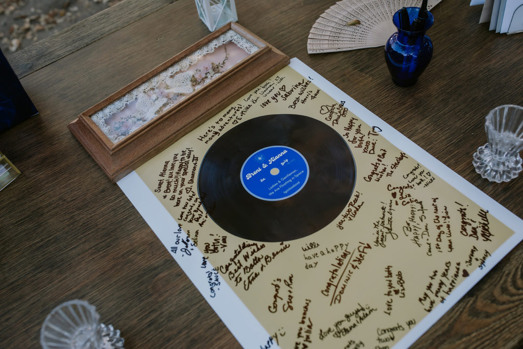 framed record that bride and groom had their guests sign